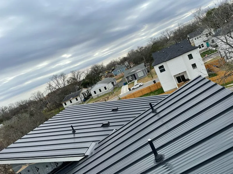 Standing seam metal roof panels with vents for Skylight Repair in Monroe